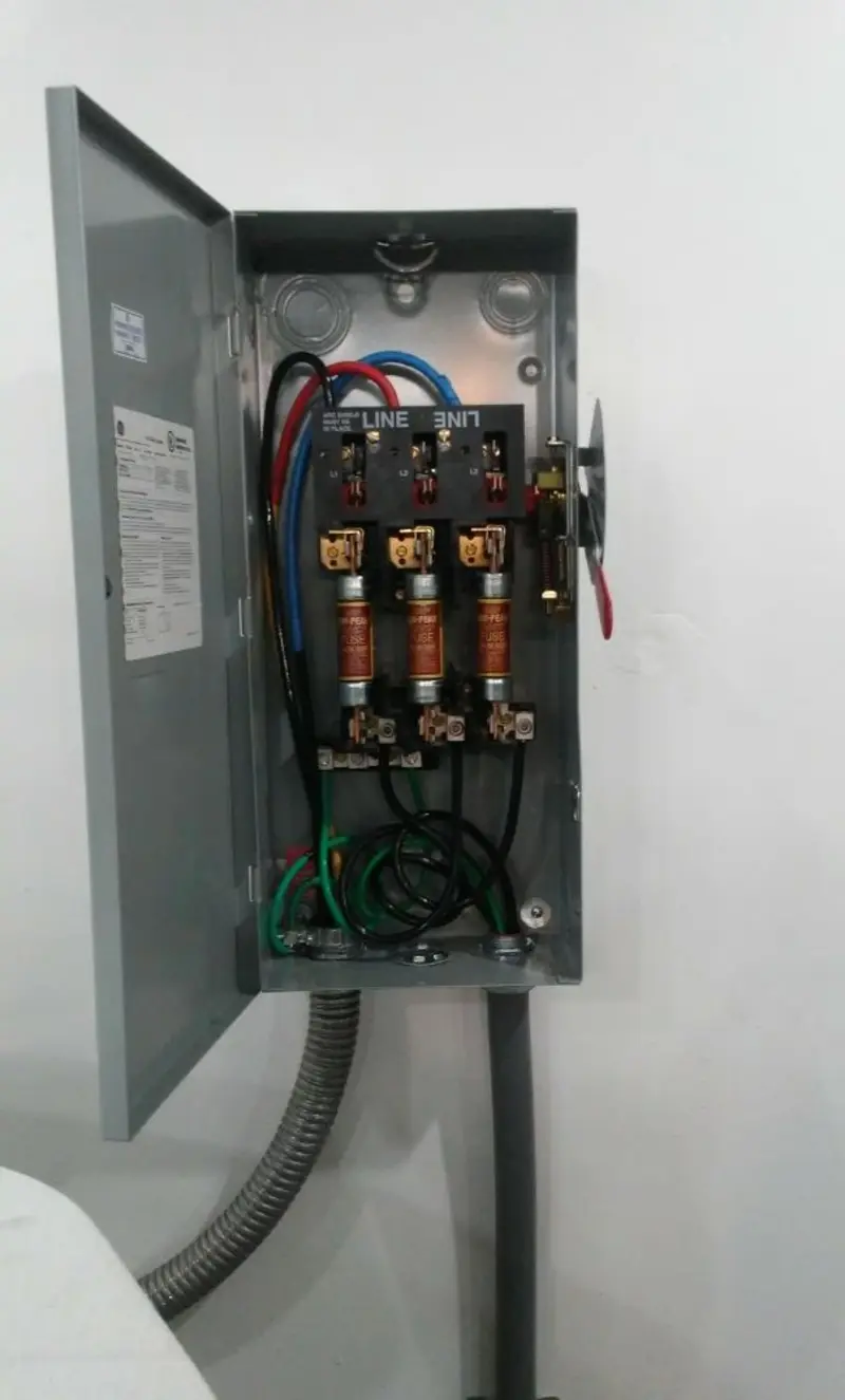 Three-phase disconnect switch installed for Smoke Detector Installation in Cushing
